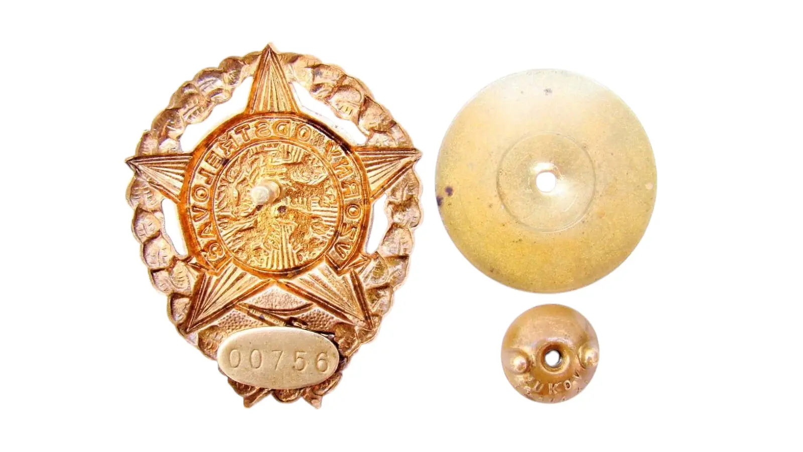 Model Sniper – badge no. 00756, reverse with serial number